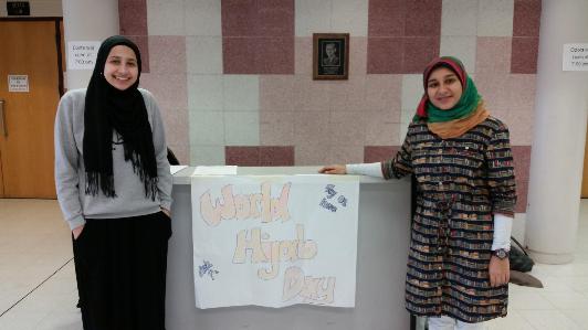 Appleton North sophomore Sara Zaidan, pictured left, and Appleton North freshman Salma Abdel-Azim, pictured left, help North learn the importance of World Hijab Day.