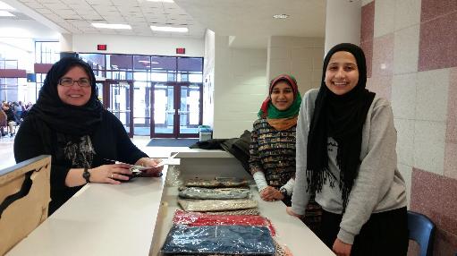 Spanish language teacher Mrs. Tesch tries on a hijab during sixth period lunch.