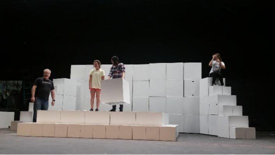 From left to right: North theatre director Ron Parker, actress Rachel Sina, and stage managers Kamy Veith and Maddy Cuff in an early rehearsal of the Alice in Wonderland One Act