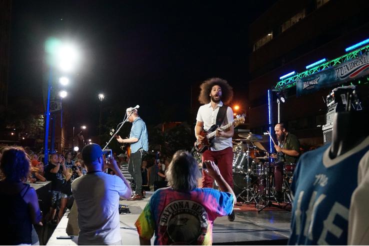 Indie rock band Wild Adriatic performs at Houdini Plaza as a Saturday night headlining act. 