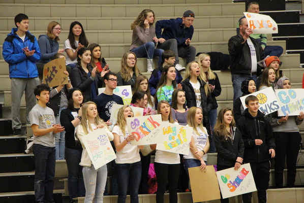 The student section cheers at the eighth annual SOAR basketball game.