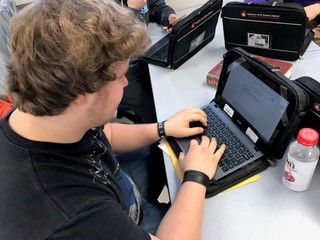 Senior Andrew Ida works on a project recently in class. Ida, along with Emma Hammond, is one of the editors of Psych Clubs podcast. 