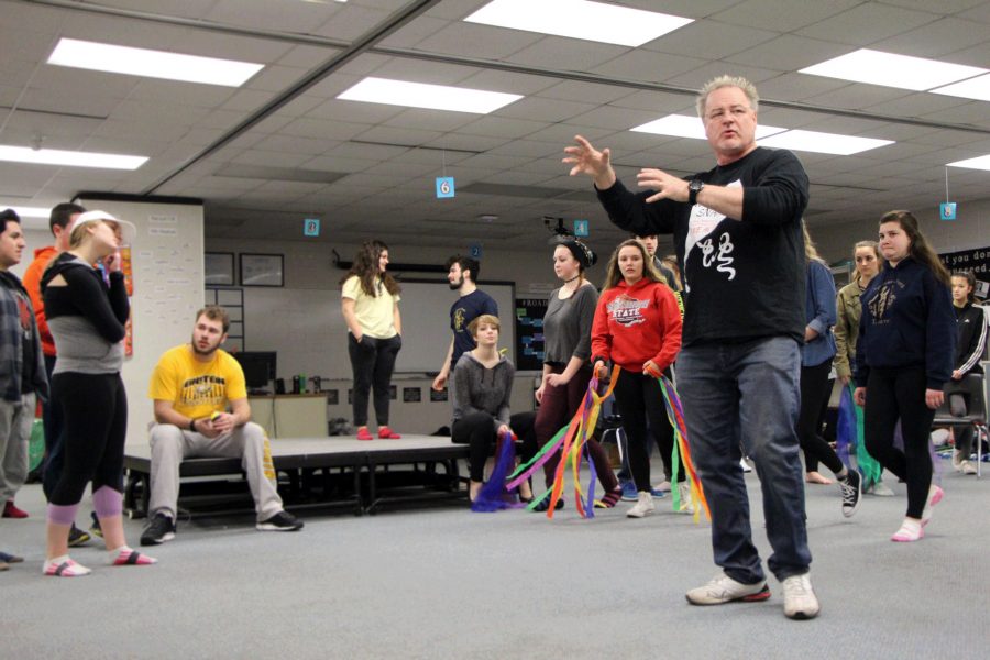 Appleton North Theatre Department Director Mr. Ron Parker guides actors into position during rehearsal on February 11 at North. The show debuts March 9.