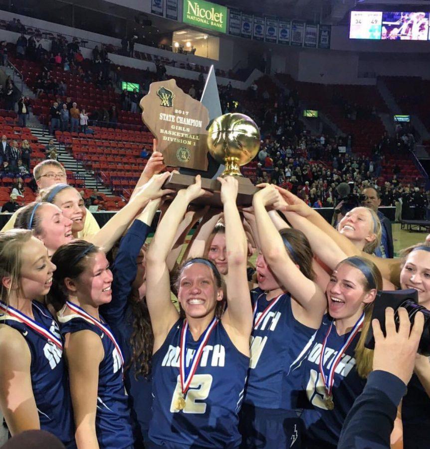 The Lady Lightning raise up their first Gold Ball in school history. The win caps off an undefeated season led by Kari Brekke, Callie Pohlman, and Sydney Levy. 
