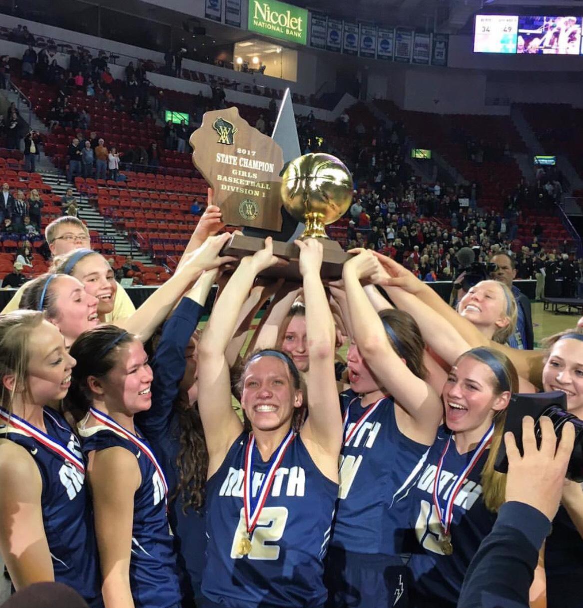 The Lady Lightning raise up their first Gold Ball in school history. The win caps off an undefeated season led by Kari Brekke, Callie Pohlman, and Sydney Levy.