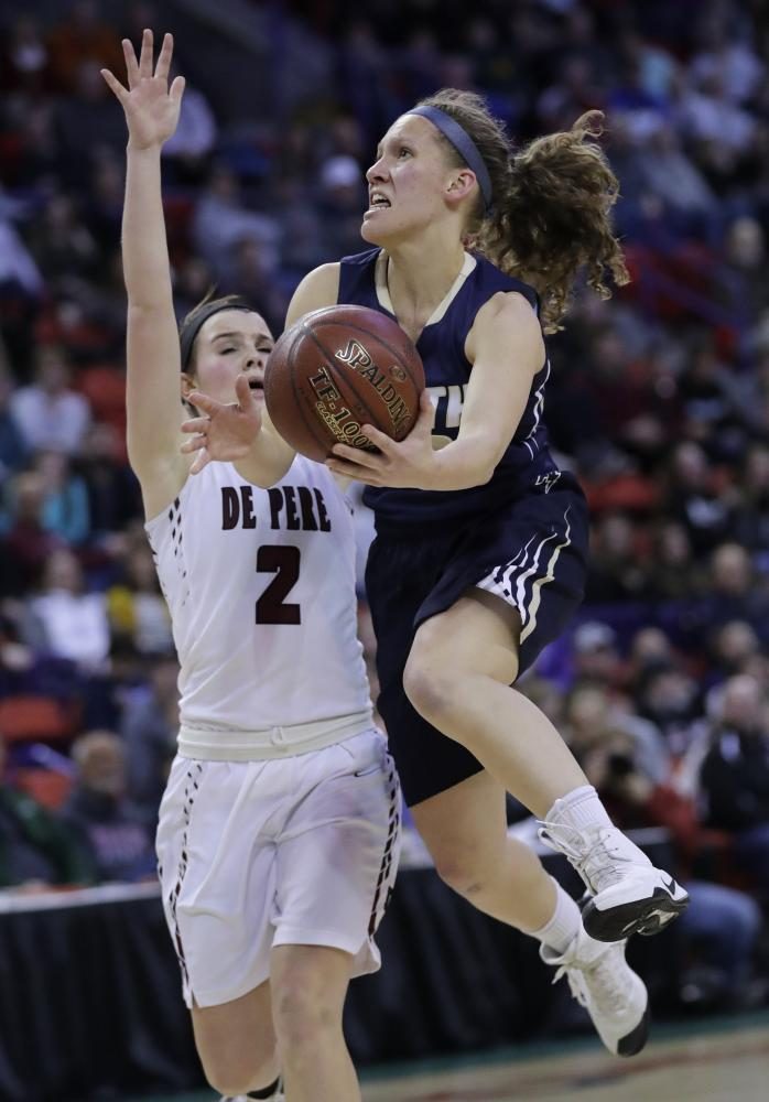 Senior Callie Pohlman driving in for a layup in the state title game. 
